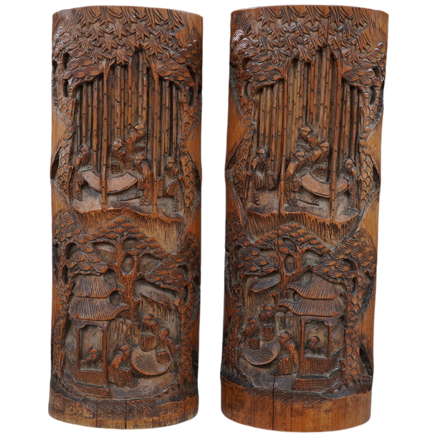 A pair of Chinese bamboo ‘seven sages of the bamboo grove’ brushpots, 33cm high. Condition - some splits